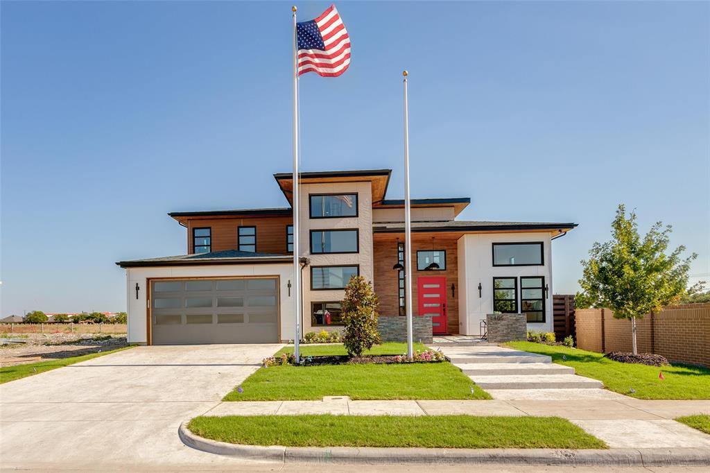 3601 Sky Rdg Lane Melissa, TX 75454 - Photo 13 of 31 a front view of a house with a yard and garage