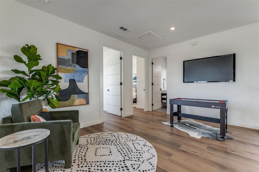 3601 Sky Rdg Lane Melissa, TX 75454 - Photo 19 of 31 a living room with furniture and a flat screen tv