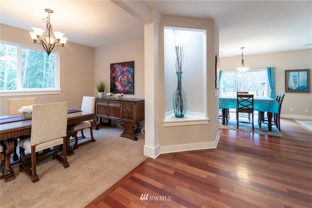 5225 Northeast 8th Place Renton, WA 98059 - Photo 8 of 38 a view of a livingroom with furniture window and wooden floor