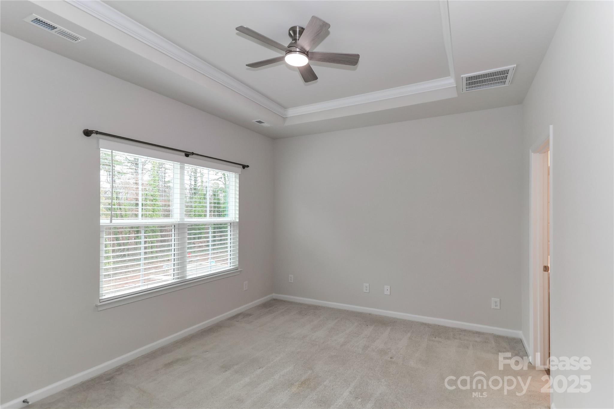 5038 Springarn Court Charlotte, NC 28208 - Photo 19 of 47 a view of an empty room with a window