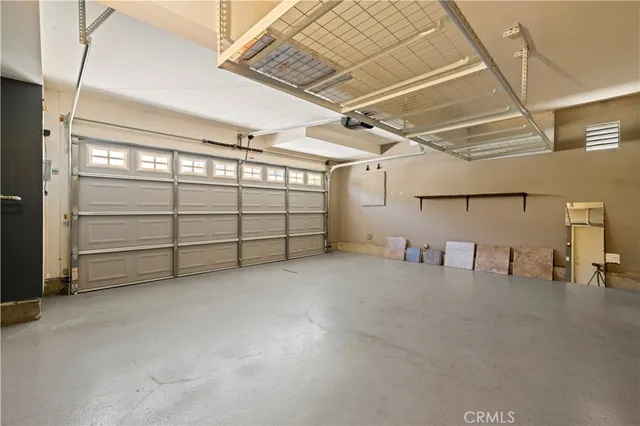 a view of a garage with stairs