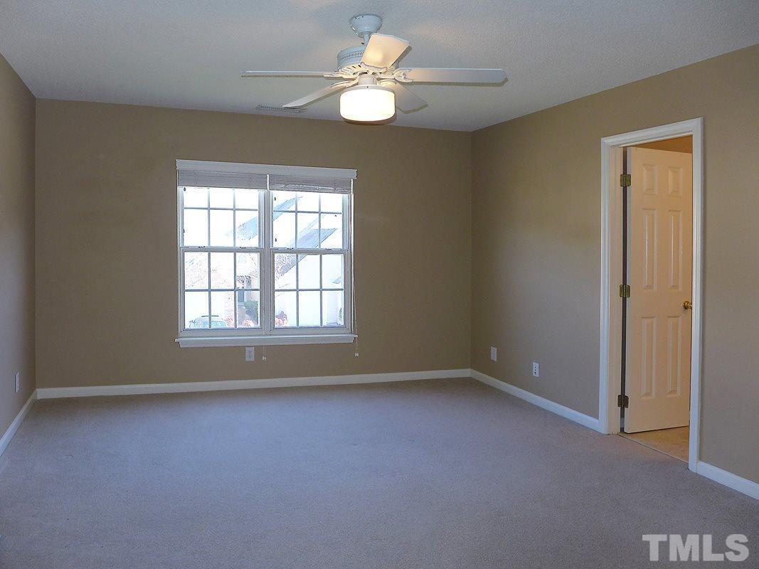 122 Higher Learning Drive Durham, NC 27713 - Photo 13 of 19 wooden floor in an empty room with a window