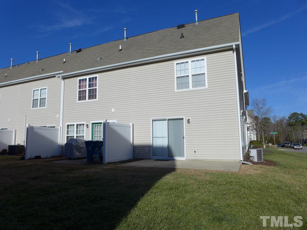 122 Higher Learning Drive Durham, NC 27713 - Photo 16 of 19 a front view of a house with a yard