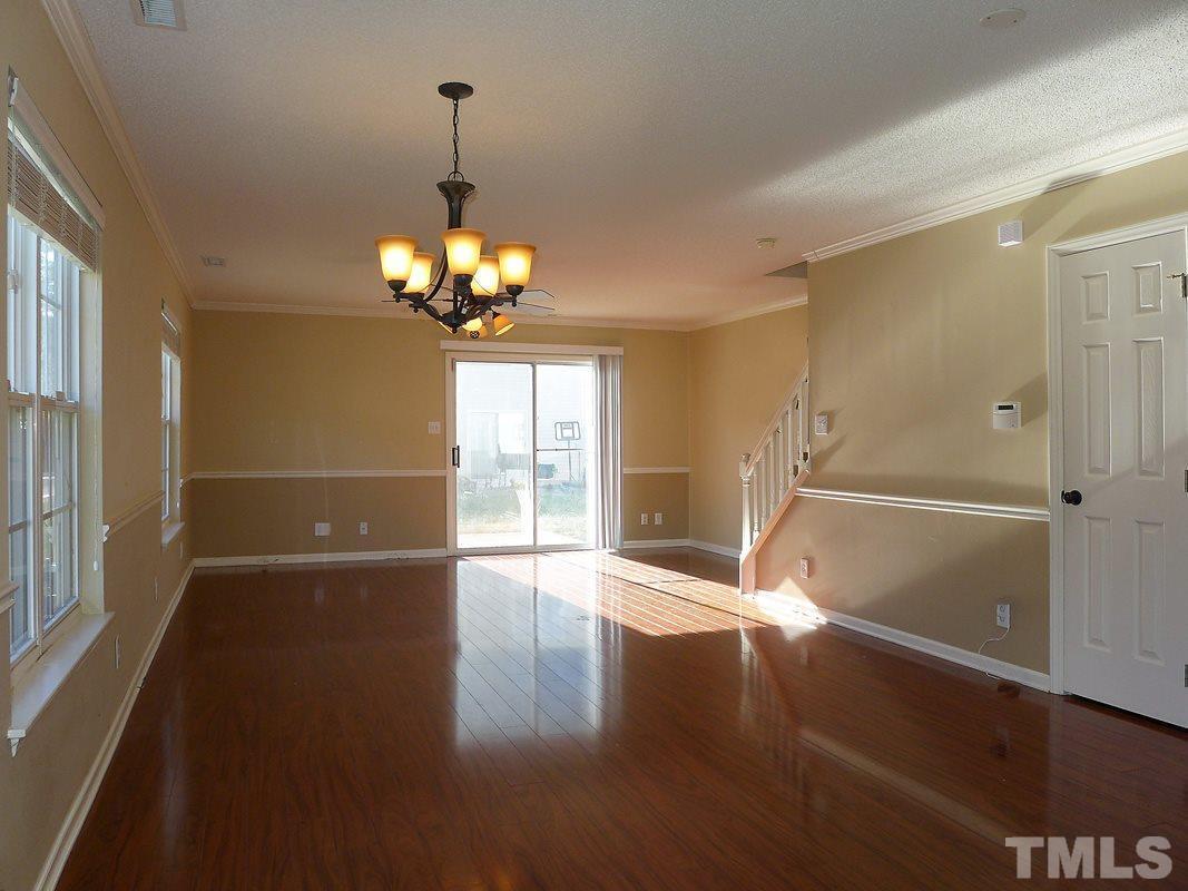 122 Higher Learning Drive Durham, NC 27713 - Photo 2 of 19 a view of an empty room with wooden floor and a window