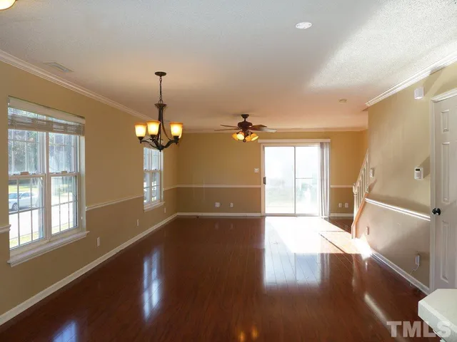 a view of a livingroom with wooden floor