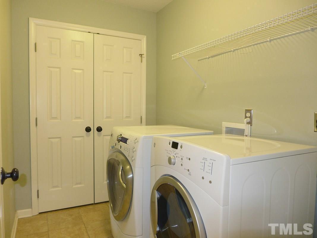 122 Higher Learning Drive Durham, NC 27713 - Photo 9 of 19 a utility room with dryer and washer
