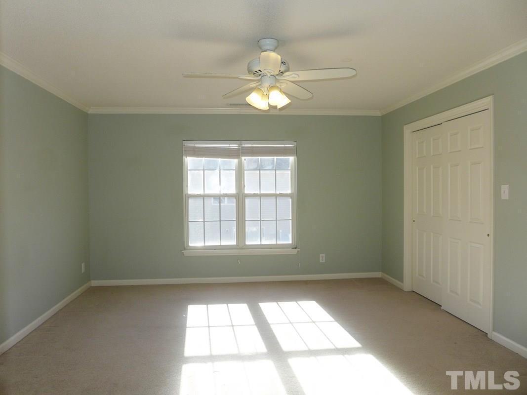122 Higher Learning Drive Durham, NC 27713 - Photo 10 of 19 wooden floor in an empty room with a window