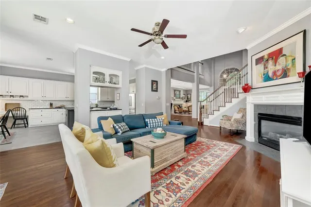 a front view of a house with swimming pool having outdoor seating