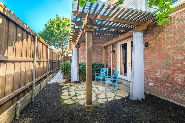 a living room with furniture a bookshelf and a bookshelf