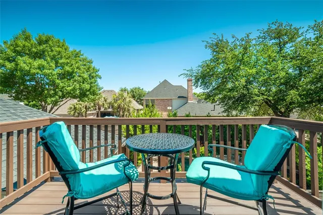 a bedroom with a bed dresser and a window