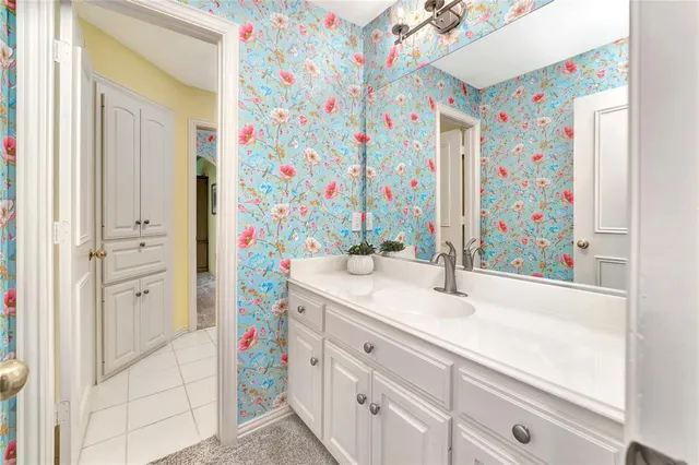 a bed room with bed and a flat screen tv