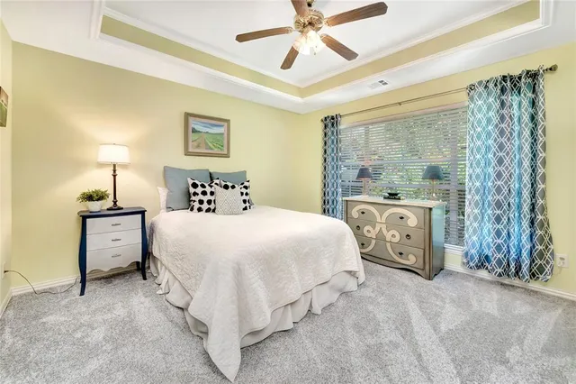 a bathroom with a sink a vanity and a shower curtain