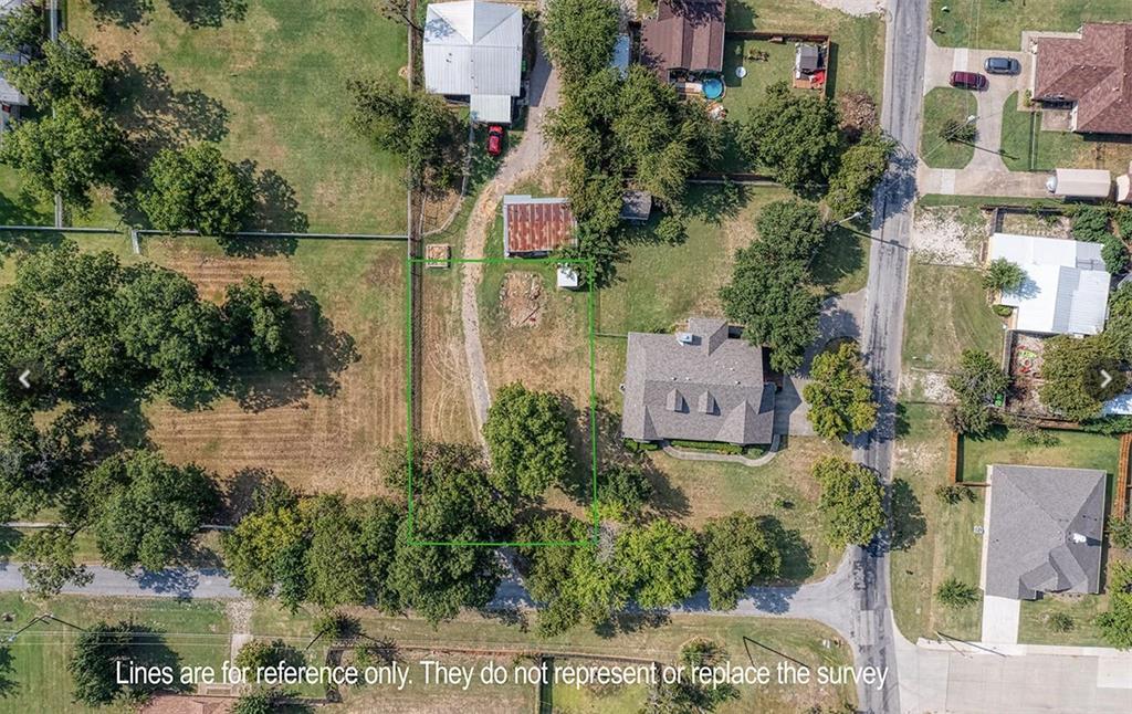 515 Eddleman Street Pilot Point, TX 76258 - Photo 1 of 5 an aerial view of residential house with outdoor space and lake view