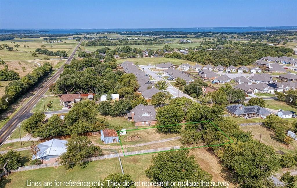 515 Eddleman Street Pilot Point, TX 76258 - Photo 2 of 5 a view of an outdoor space and mountain view