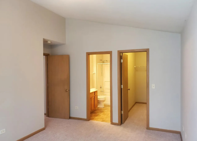 1449 McClure Road, Unit 1449 Aurora, IL 60505 - Photo 13 of 25 a view of bathroom with a tub and shower