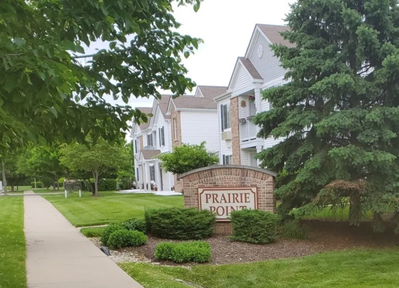 1449 McClure Road, Unit 1449 Aurora, IL 60505 - Photo 20 of 25 a view of a house with a yard and plants