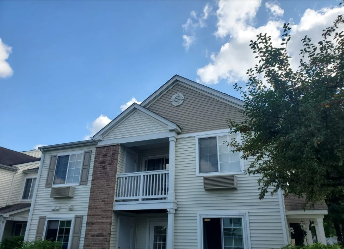 1449 McClure Road, Unit 1449 Aurora, IL 60505 - Photo 23 of 25 a front view of a house with a yard