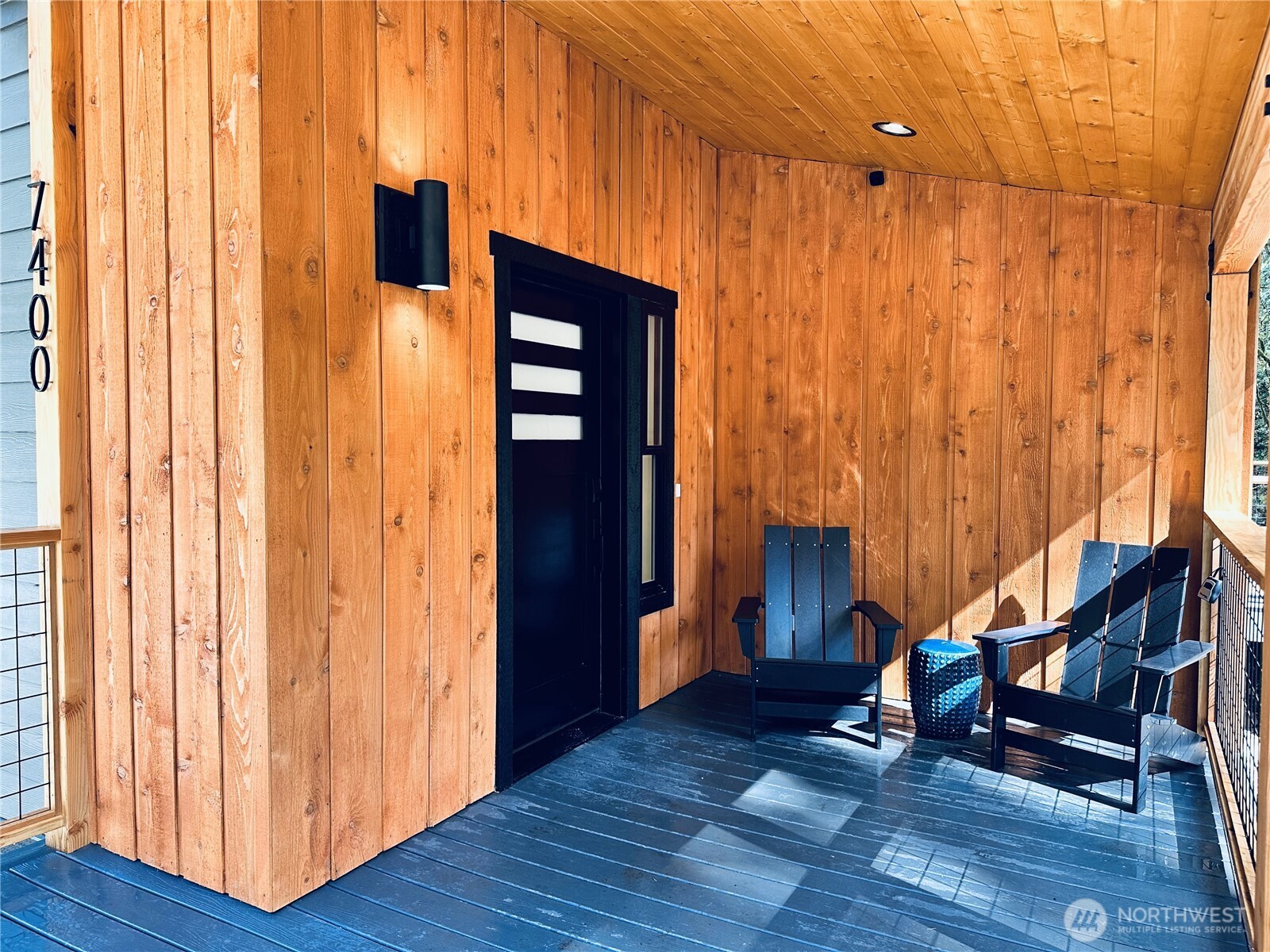 7400 Miller Way Deming, WA 98244 - Photo 6 of 27 an empty room with wooden floor and windows