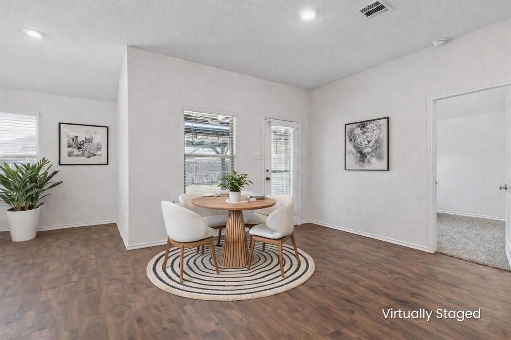705 Windmill Street Royse City, TX 75189 - Photo 4 of 20 Breakfast nook off of the kitchen and open to the family room, great for entertaining.