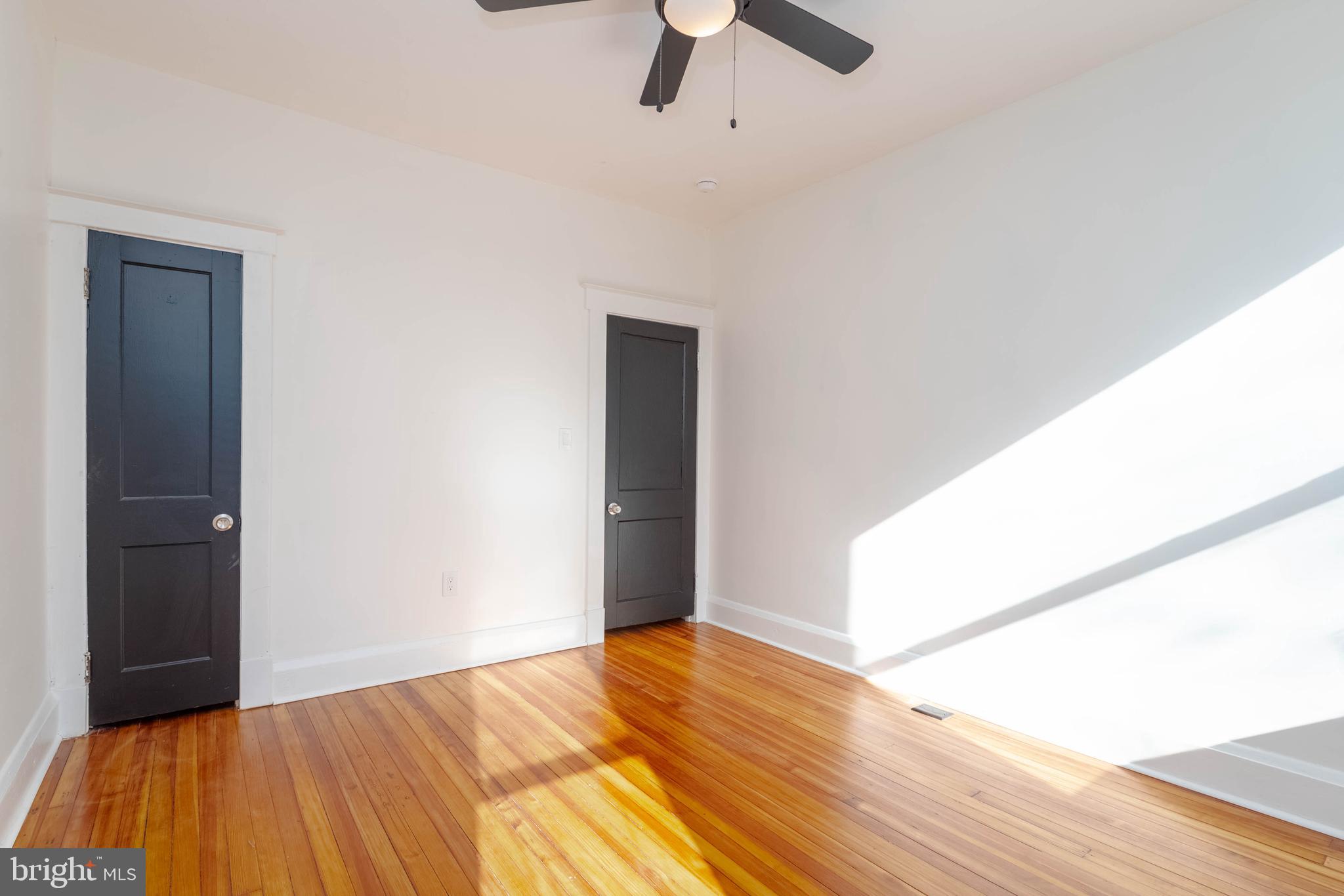 1202 West 42nd Street Baltimore, MD 21211 - Photo 26 of 47 a view of a room with wooden floor