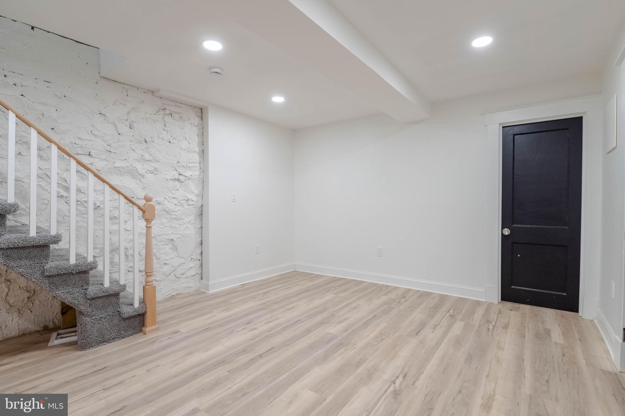 1202 West 42nd Street Baltimore, MD 21211 - Photo 33 of 47 a view of entryway with wooden floor