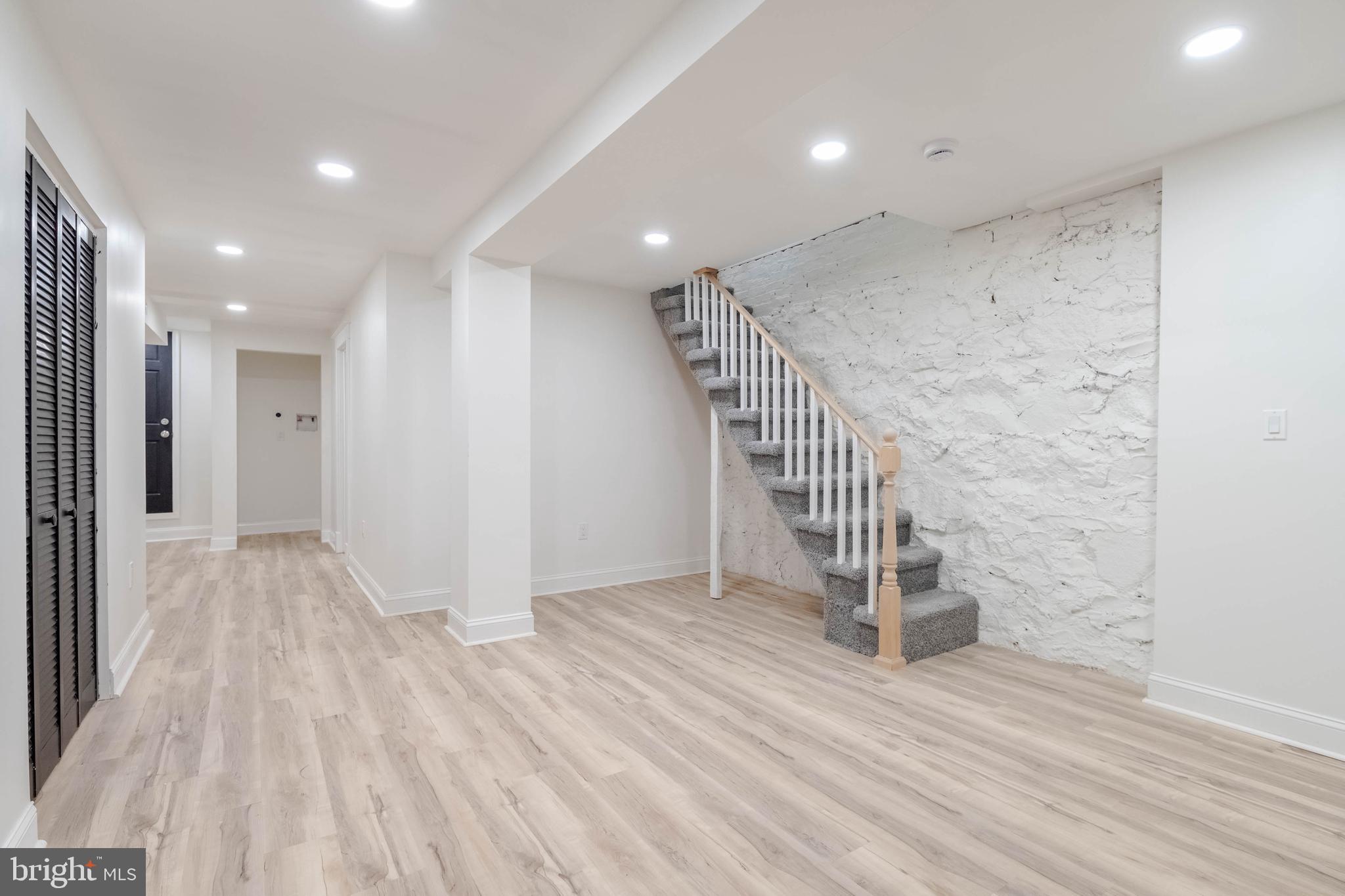 1202 West 42nd Street Baltimore, MD 21211 - Photo 34 of 47 a view of entryway with wooden floor