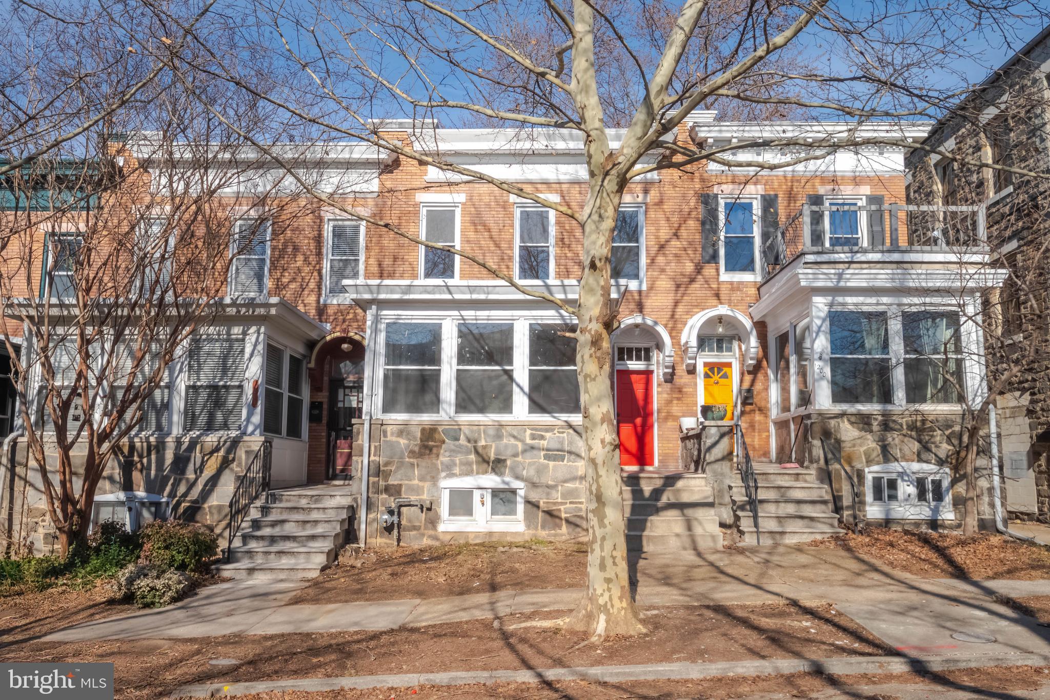 1202 West 42nd Street Baltimore, MD 21211 - Photo 46 of 47 a building with glass door
