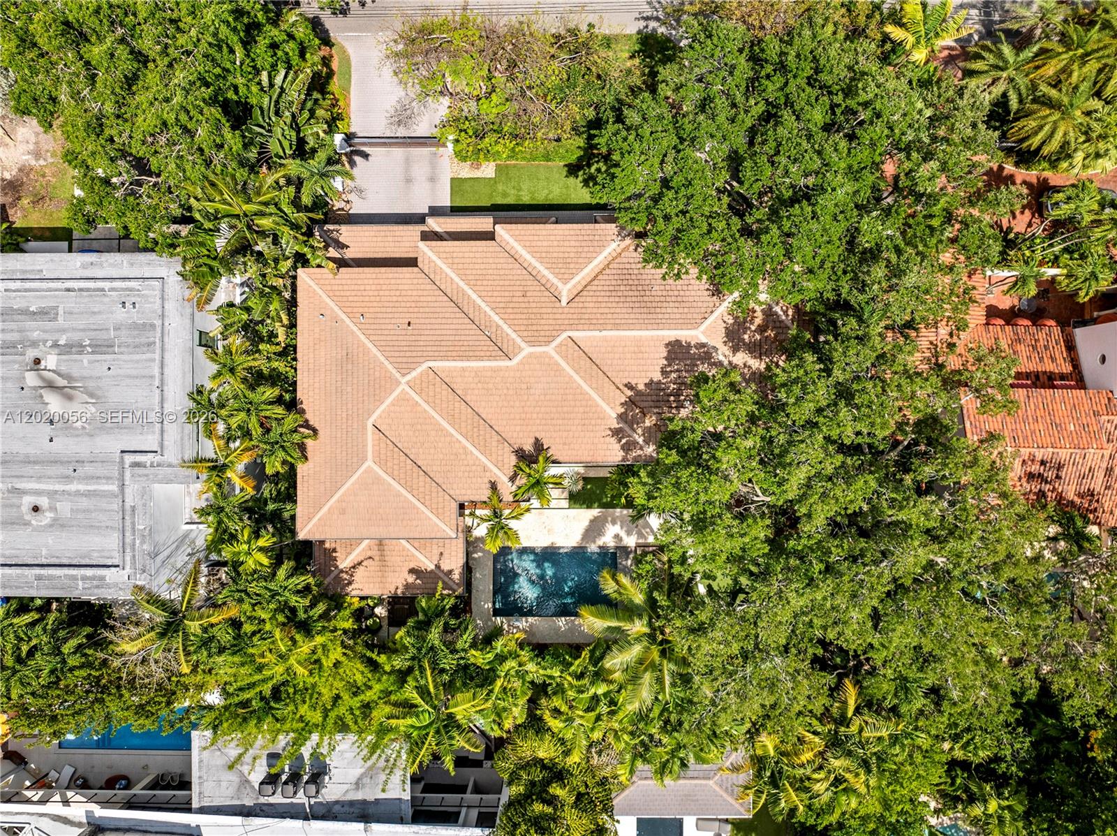 4196 Douglas Road Miami, FL 33133 - Photo 93 of 96 an aerial view of a house with a yard