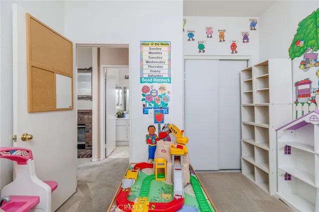a bathroom with a sink toilet and mirror