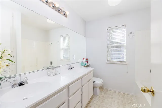 a view of a building with sitting area