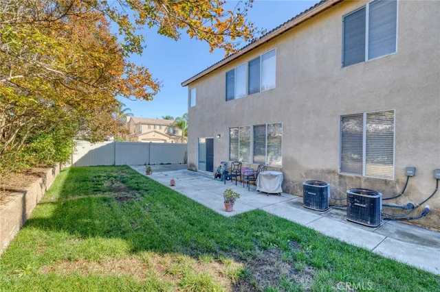a view of balcony with wooden floor
