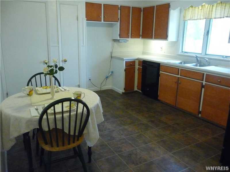 205 Zurbrick Road Cheektowaga, NY 14043 - Photo 3 of 14 Kitchen. Spacious kitchen newer flooring, sufficie