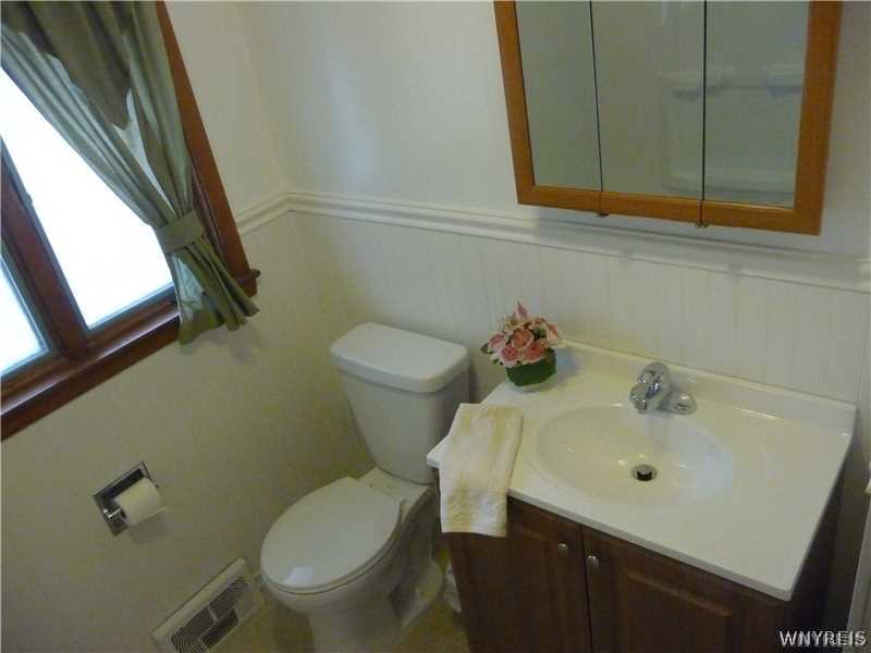 205 Zurbrick Road Cheektowaga, NY 14043 - Photo 4 of 14 Bathroom. Updated bath w/ceramic floor, new vanity