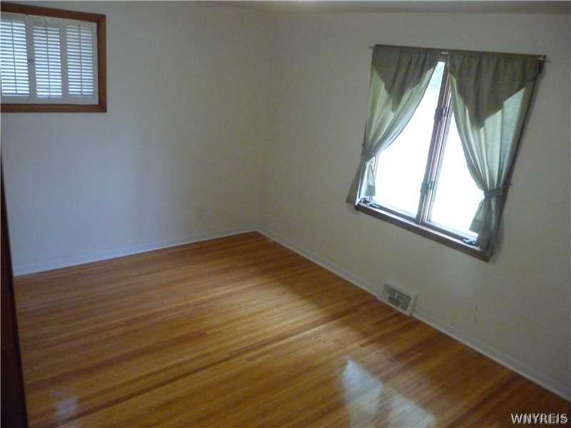 205 Zurbrick Road Cheektowaga, NY 14043 - Photo 6 of 14 Bedroom. Spacious 14 by 12 bedroom with refinish