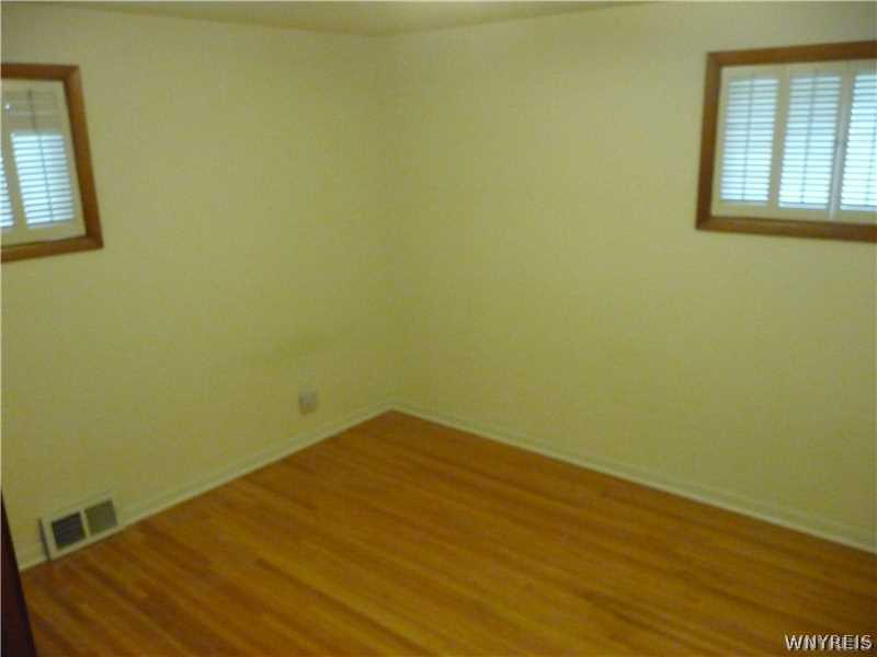 205 Zurbrick Road Cheektowaga, NY 14043 - Photo 7 of 14 Bedroom. 2nd bedroom with beautiful refinished har