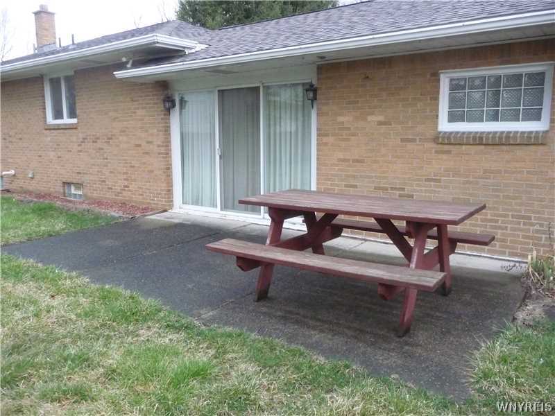 205 Zurbrick Road Cheektowaga, NY 14043 - Photo 8 of 14 Exterior Back. Patio with sliding glass door to yo