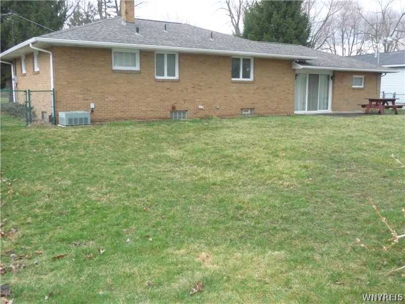 205 Zurbrick Road Cheektowaga, NY 14043 - Photo 9 of 14 Exterior Back. Spacious fenced yard