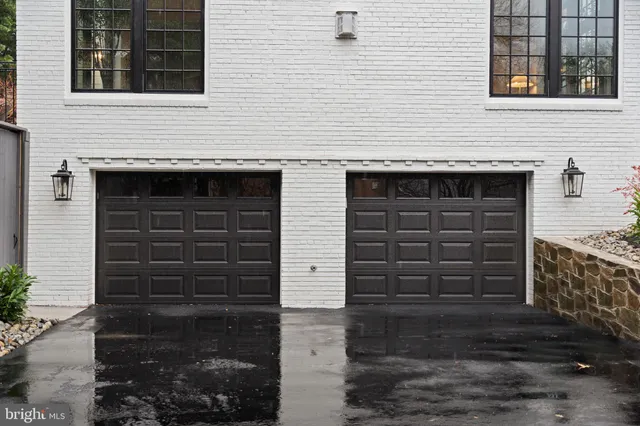 a front view of a house with a garage