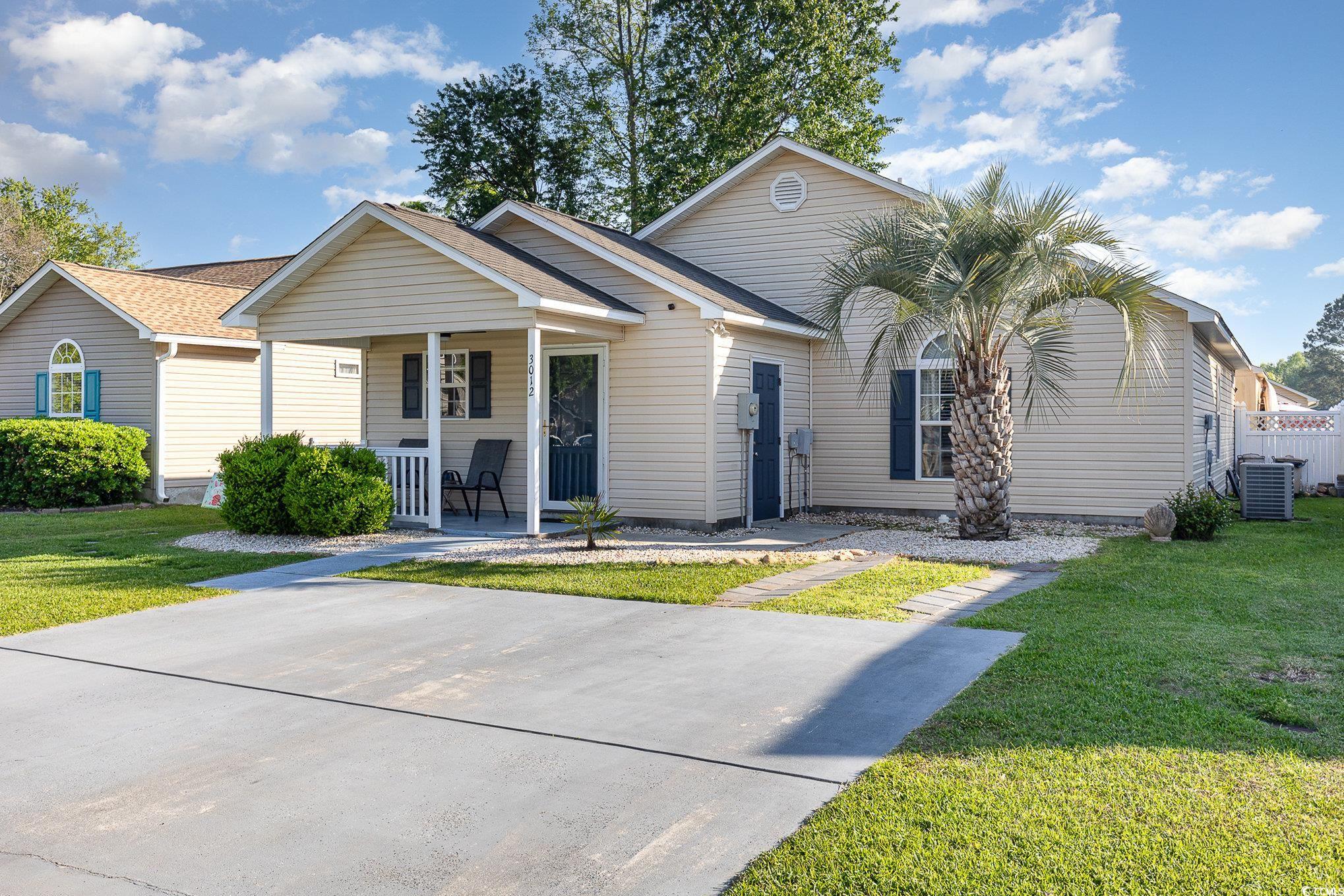 3012 Sabal Court Murrells Inlet, SC 29576 - Photo 1 of 29 Ranch-style home featuring central AC, a front law