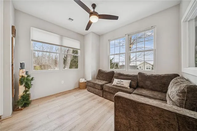 a view of a livingroom with furniture and window