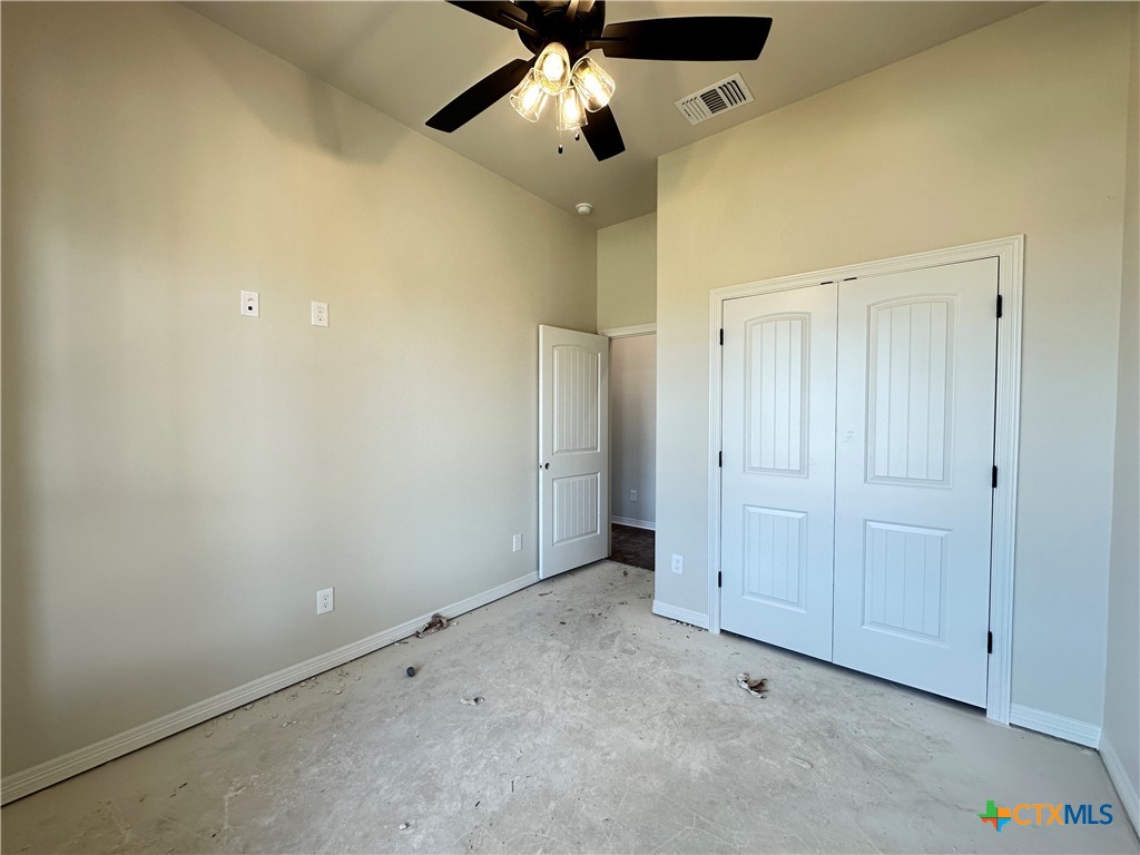 4417 Agave Trail Temple, TX 76502 - Photo 13 of 19 an empty room with chandelier fan