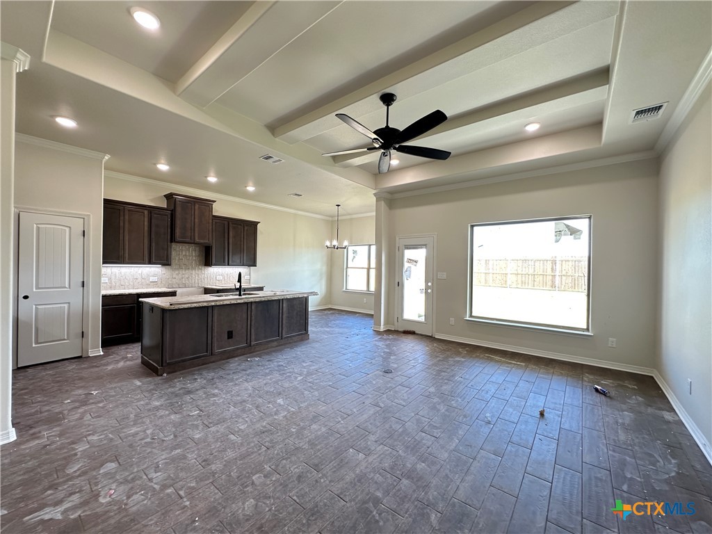 4417 Agave Trail Temple, TX 76502 - Photo 4 of 19 a living room with stainless steel appliances kitchen island furniture and a large window