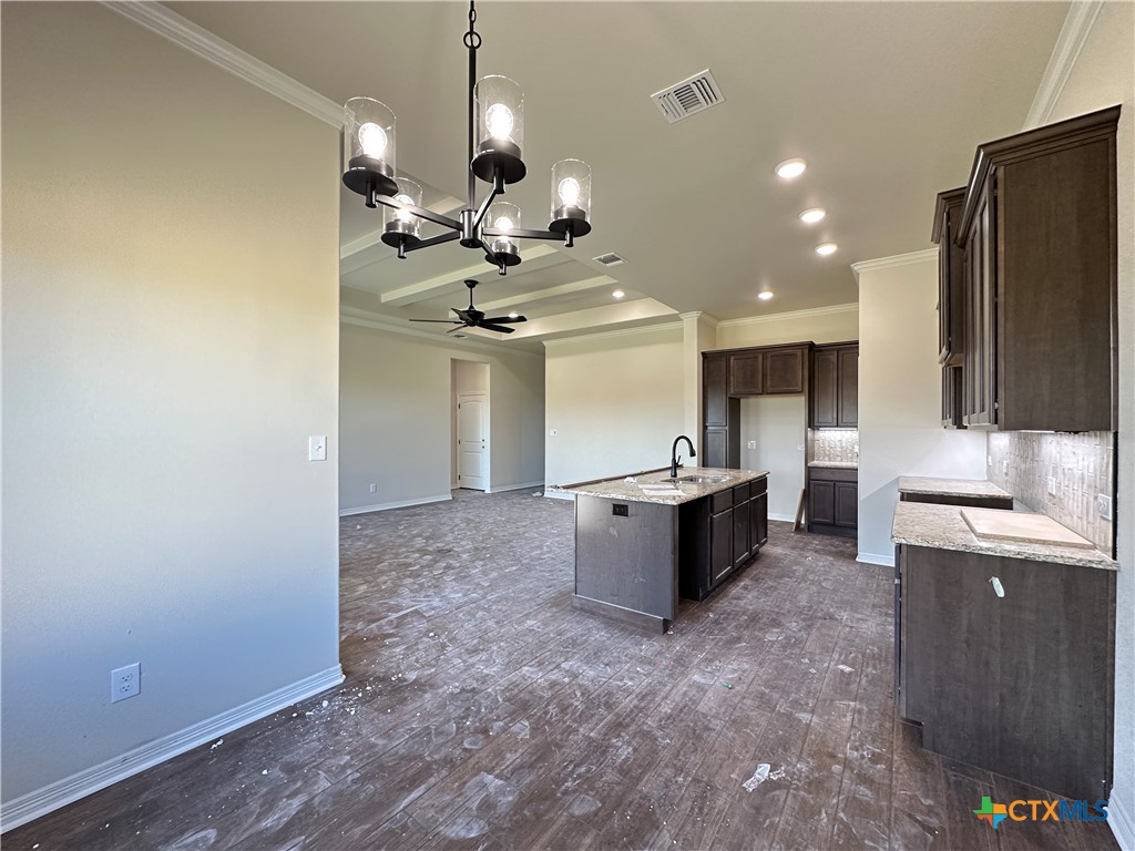 4417 Agave Trail Temple, TX 76502 - Photo 7 of 19 a large kitchen with a large counter top appliances and cabinets