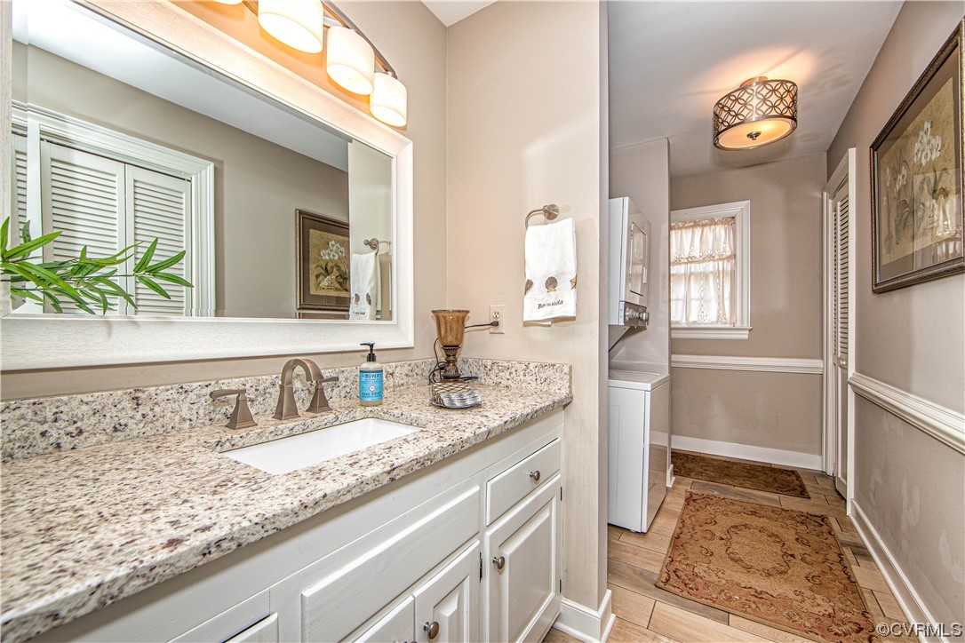 2729 Judes Ferry Road Powhatan, VA 23139 - Photo 21 of 50 This is a hall bath for guests but also has a W/D for the 1st floor.