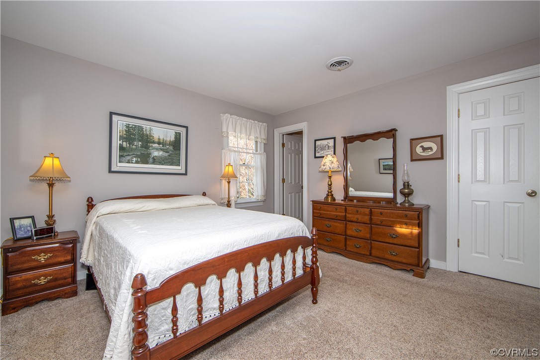 2729 Judes Ferry Road Powhatan, VA 23139 - Photo 22 of 50 2n primary bedroom has a full bath.