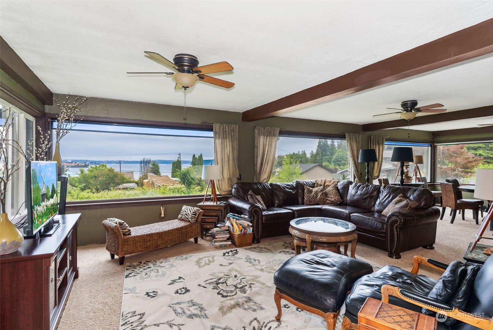 7911 East Maple Street Port Orchard, WA 98366 - Photo 13 of 39 a living room with furniture and a large window