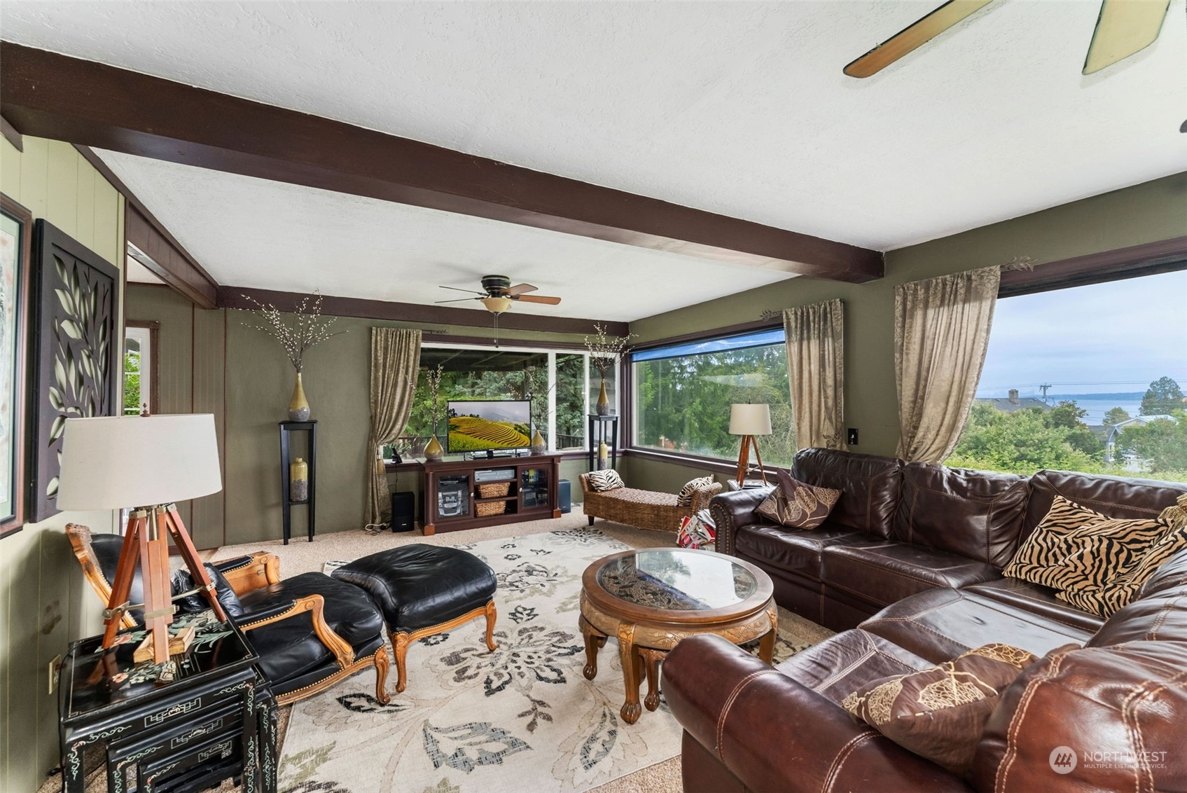 7911 East Maple Street Port Orchard, WA 98366 - Photo 14 of 39 a living room with furniture and a large window