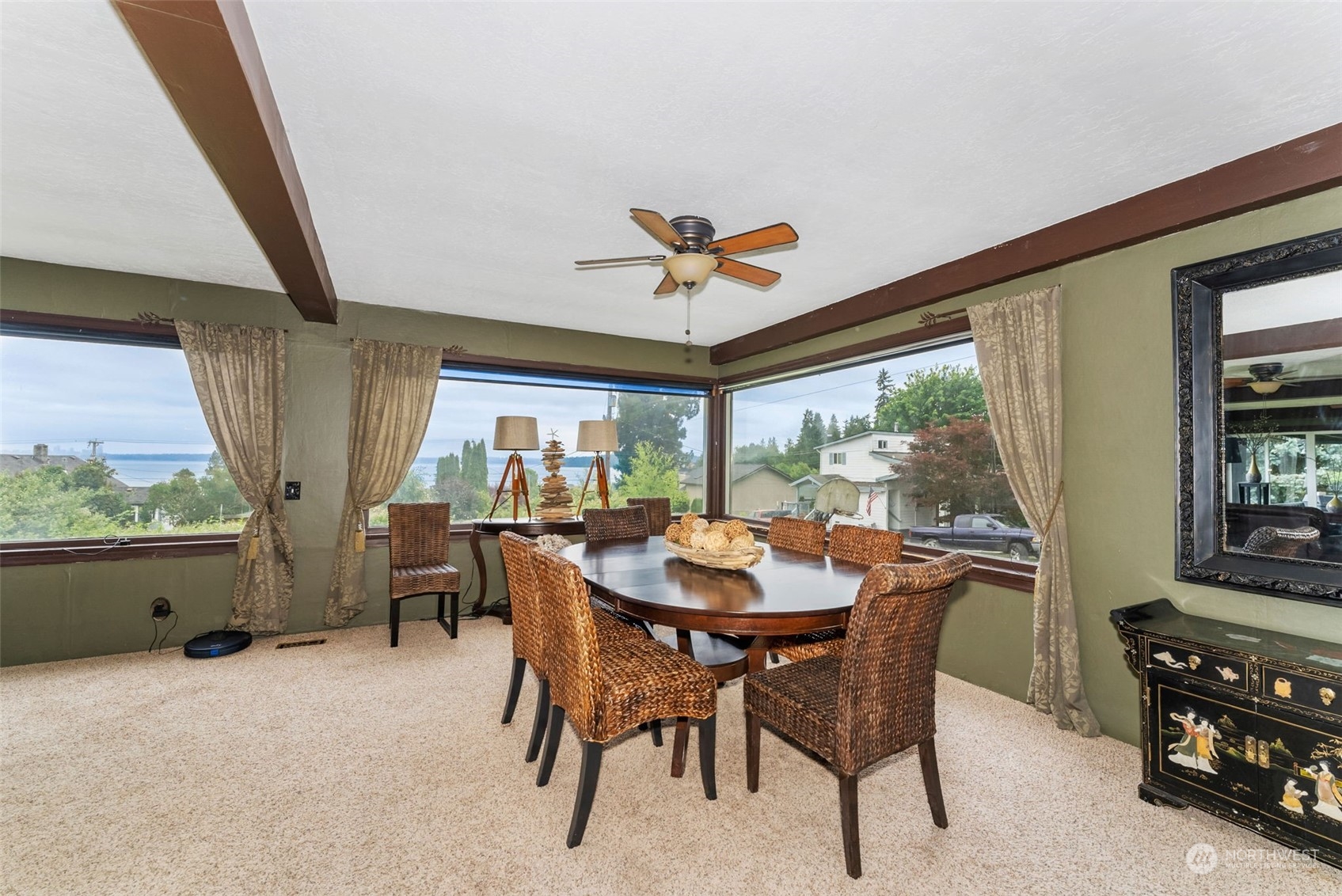 7911 East Maple Street Port Orchard, WA 98366 - Photo 15 of 39 a view of a dining room with furniture window and outside view