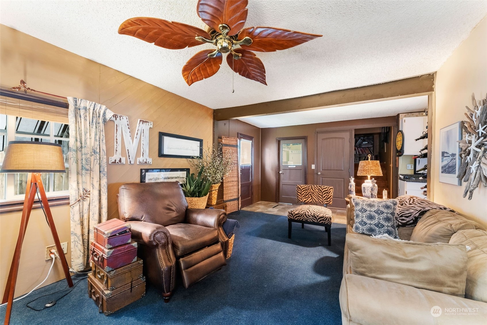 7911 East Maple Street Port Orchard, WA 98366 - Photo 25 of 39 a living room with furniture and a large window