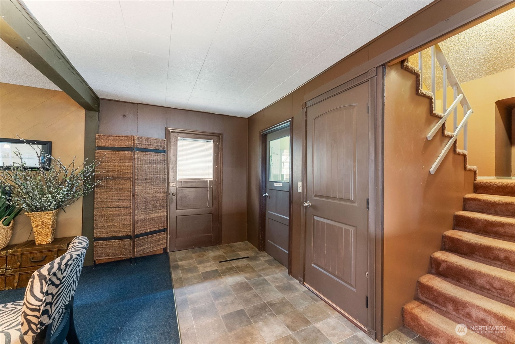7911 East Maple Street Port Orchard, WA 98366 - Photo 26 of 39 a view of an entryway with staircase